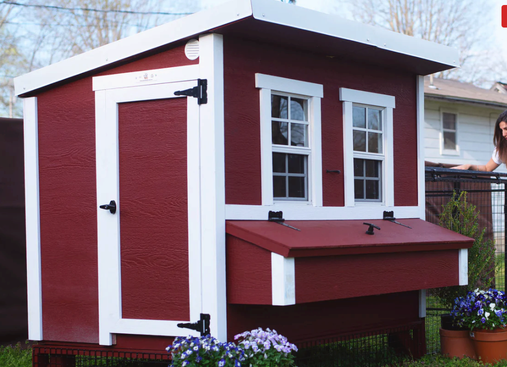 Photo of a red chicken shack.